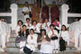 Venerable Phrakhru Sitthiwarakhom poses with members from Thailand.